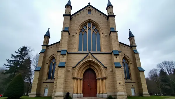 Stone Church Facade With Stained Glass Windows