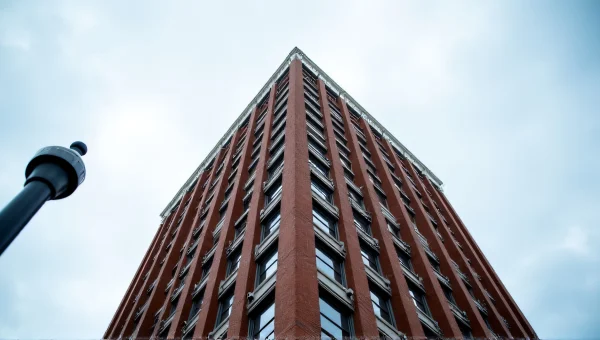 Tall Brick Office Building Against Clear Sky