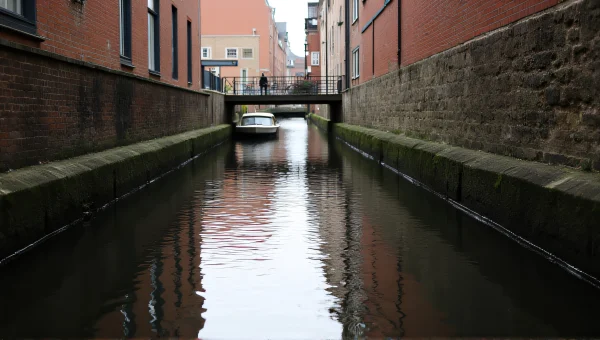 Tranquil Water Channel Between Stone Walls