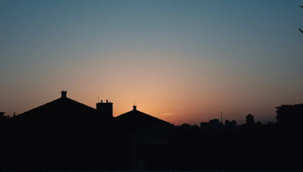 Urban Silhouette Against Gradient Sky At Dusk