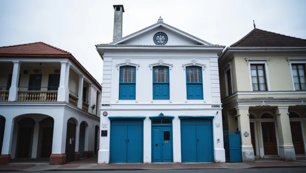 White And Blue Building Facade In Urban Setting