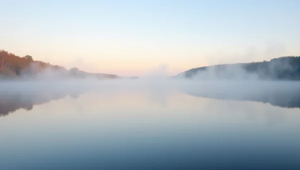 Wide Freshwater Lake At Dawn With Mist Reflection