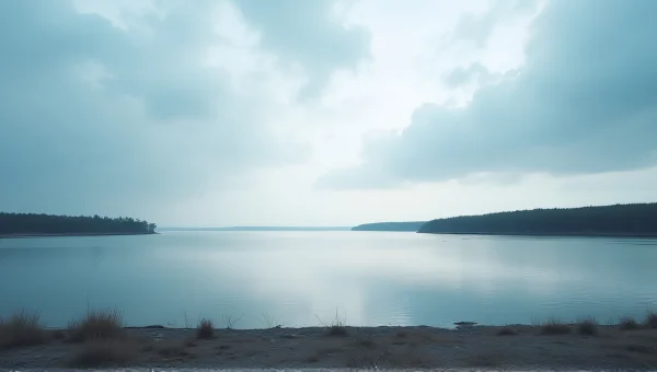Wide Lake Under Cloudy Sky With Shoreline