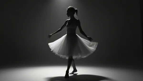 Woman Dancing Mid-Twirl In Grayscale Photography
