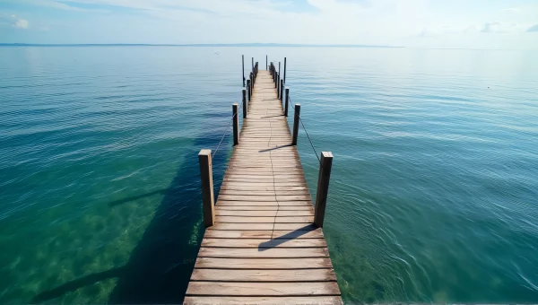Wooden Dock Over Calm Ocean Aerial View
